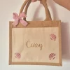 Sac en jute coquillages à paillettes avec noeud